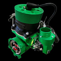 Green engine block with various components on a white background