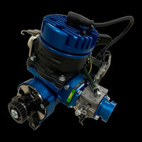 Blue and black mechanical engine component on a black background