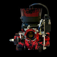 Engine block with red and black design on a black background