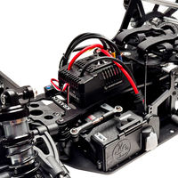 Close-up of a mechanical model with wiring and components on a white background