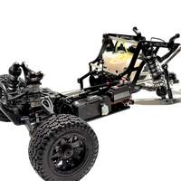 Model of a VEKTA buggy chassis with suspension and wheels on a white background