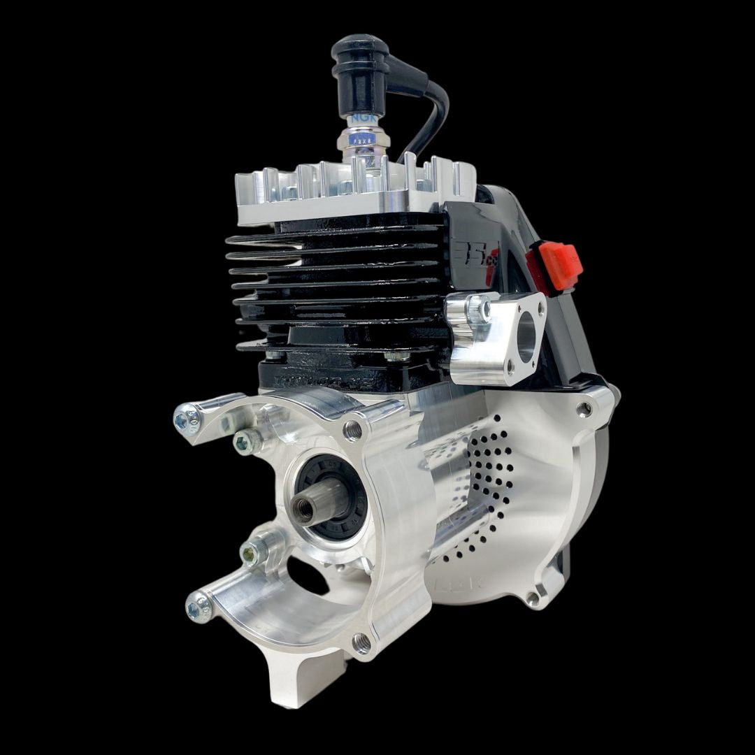 A TAYLOR 35 V2 Billet Piston Port RC Engine, showcasing a silver aluminum body and black plastic components, designed for 1/5 scale gas powered remote control vehicles.