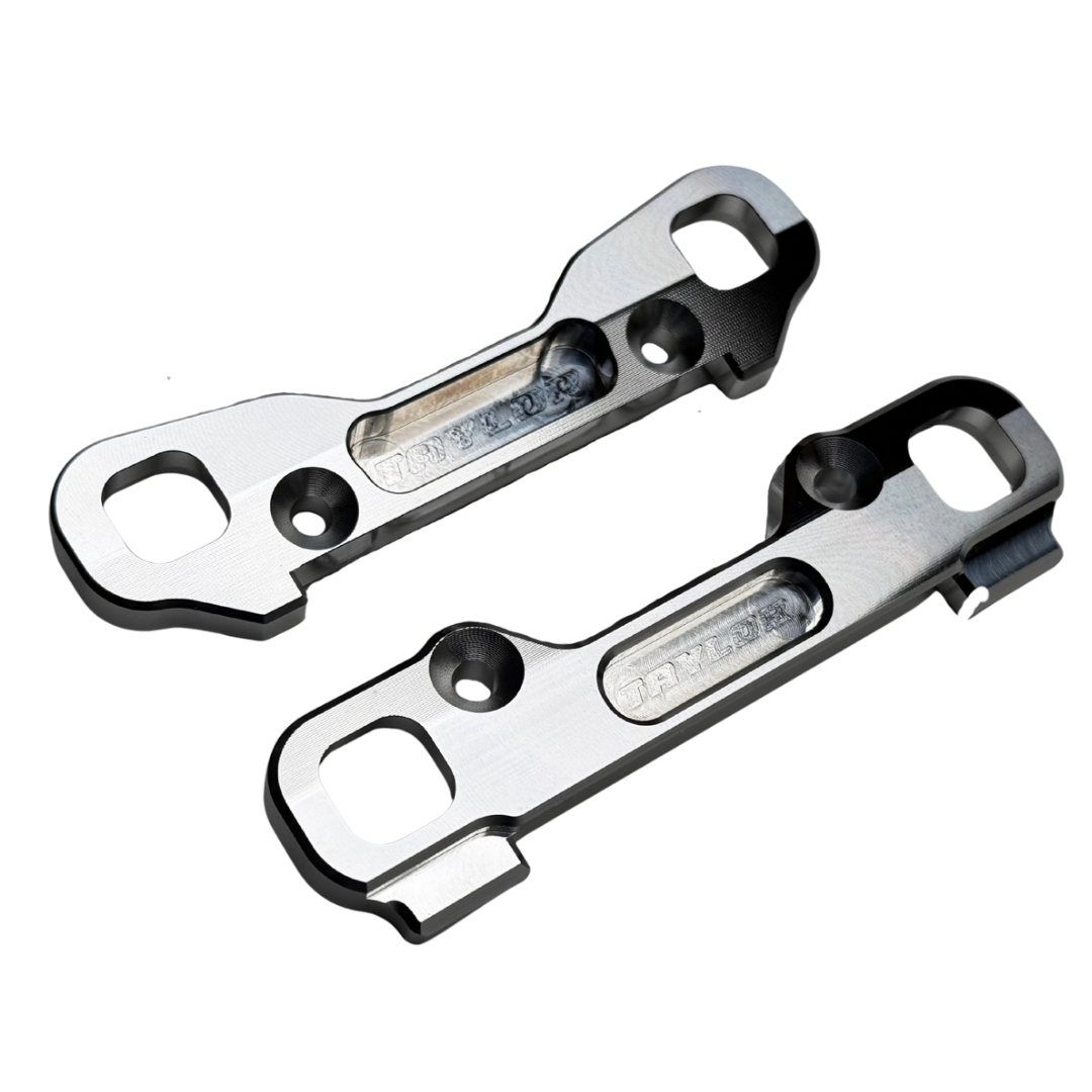 Two hinge pin braces on a white background