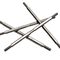 Crossed metal rods with threaded ends on a white background