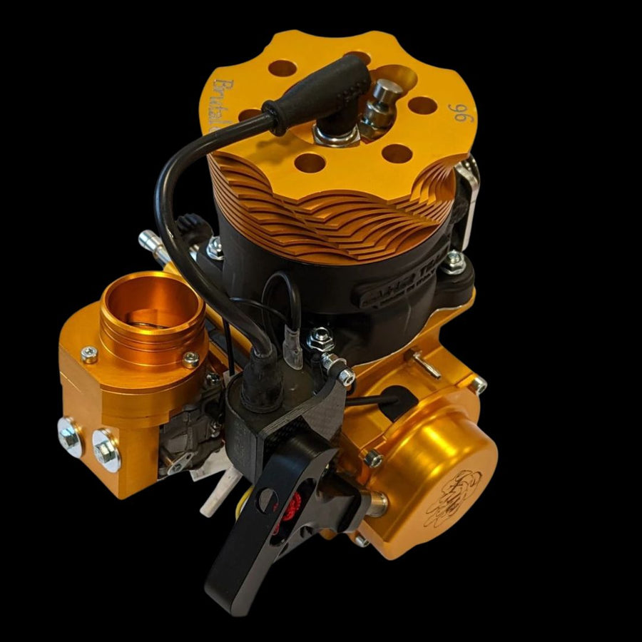 Gold and black engine block on a black background
