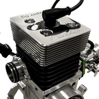 Close-up of a silver engine block with visible branding on a white background