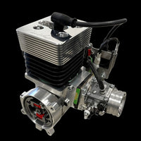 Engine block with various components on a black background