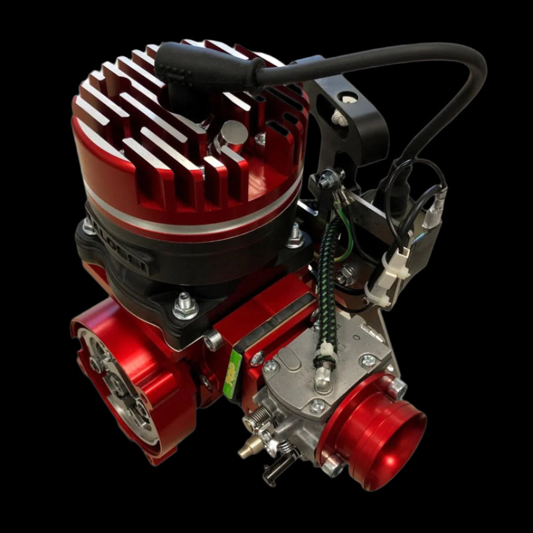 Red and black engine or motor component on a black background