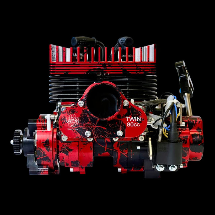 Red and black engine model on a black background