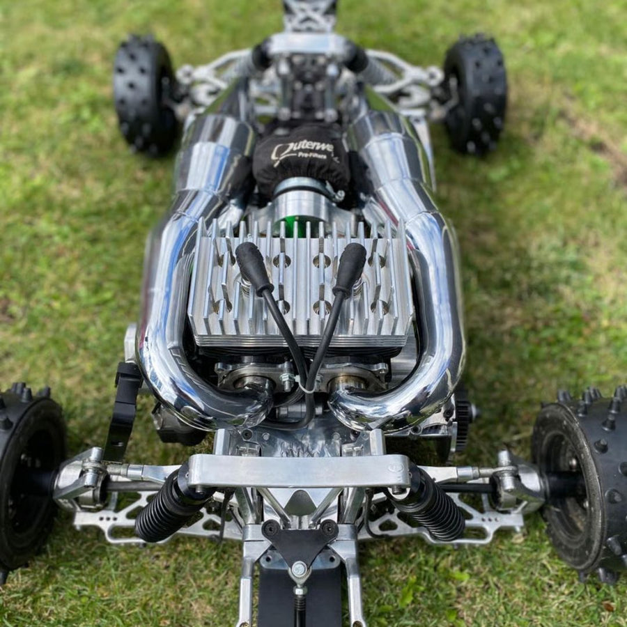 Close-up of a metallic model car on grass