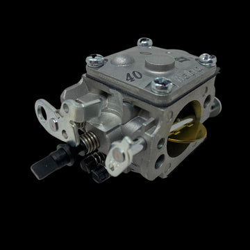 A new Walbro WJ146 Extreme Carb, which is a replacement for the WJ71 carburetor, with visible adjustments and fuel intake.